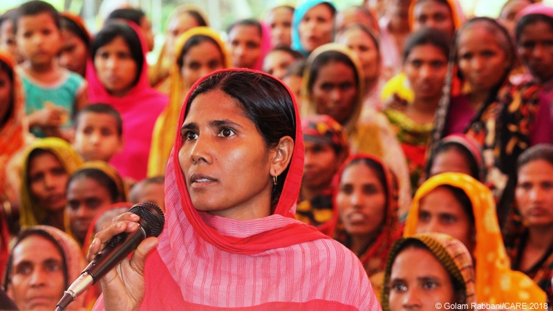 Woman speaking at a local open budget meeting, Bangladesh 