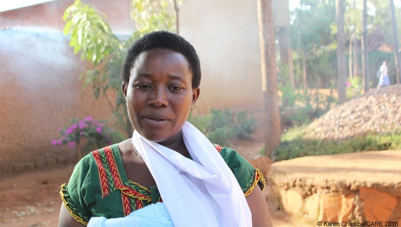 Member of Gikundiro VSLA in Rwanda, part of the POWER Africa project