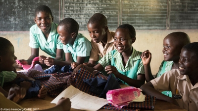 Boys and girls at school in Zimbabwe learning how to sew reusable sanitary pads. 