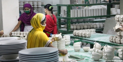 Women workers in a pottery factory in Bangladesh, part of the Living Blue collective supported by CARE