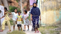 Ernawati, a woman in Indonesia who in the aftermath of the tsunami received a Family Survival Kit from CARE, and support in starting a small business which is now thriving