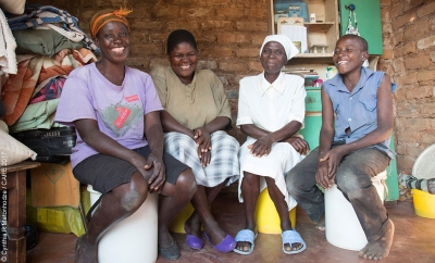 CARE cash transfer programme beneficiary and gender and accountability focal point Ropafadzo Gwenyama (second from right) with her family in Masvingo, Zimbabwe