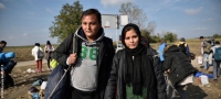 Two refugees from Afghanistan pictured by a roadside near the Serbia-Croatia border in 2015