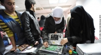 Samia (name changed), a Syrian refugee living in Jordan, is learning laptop and computer repair through a CARE vocational training programme