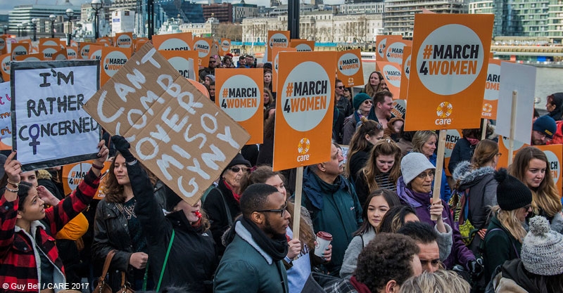 People marching at the #March4Women event in London for International Women's Day 2017