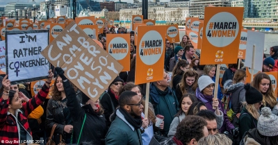 People marching at the #March4Women event in London for International Women's Day 2017