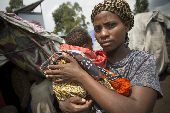 A survivor of sexual violence in conflict in the Democratic Republic of Congo with her baby. Photo: Jake Lyell  / CARE