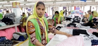 Fiedowshi works in the inspection section at a garment factory in Bangladesh