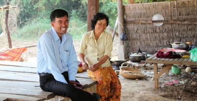 A lendwithcare entrepreneur meeting a a loan officer from lendwithcare partner the Cambodian Community Savings Federation