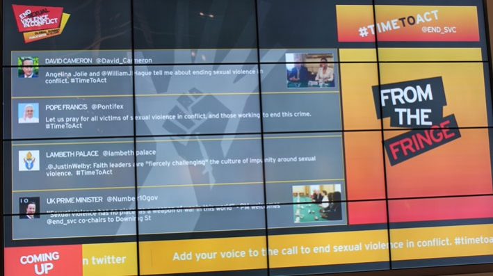 An electronic display board at the Global Summit