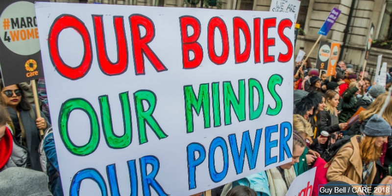 A placard at CARE&rsquo;s #March4Women event on International Women&rsquo;s Day 2018