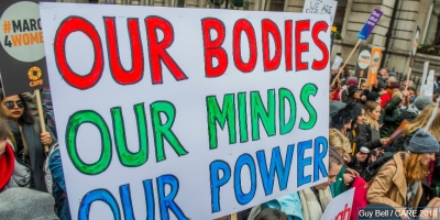 A placard at CARE&rsquo;s #March4Women event on International Women&rsquo;s Day 2018