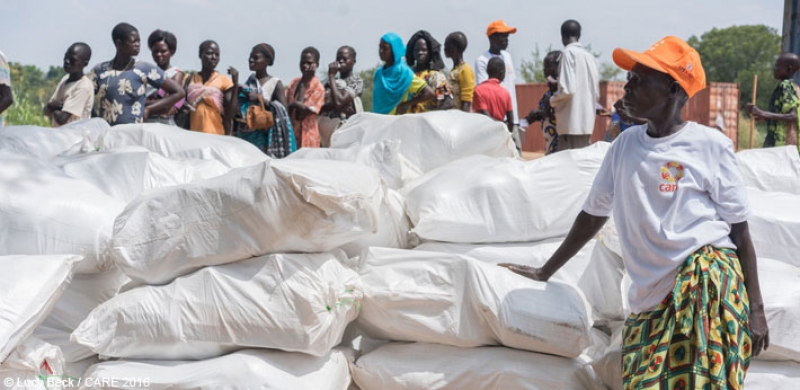 Residents of Torit, Eastern Equatoria, South Sudan wait in line to receive relief items
