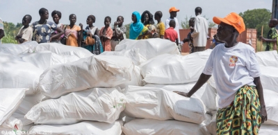 Residents of Torit, Eastern Equatoria, South Sudan wait in line to receive relief items