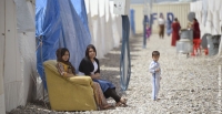 Women at Berseve 1, one of the largest camps for displaced people in northern Iraq, with almost 15,000 people living there