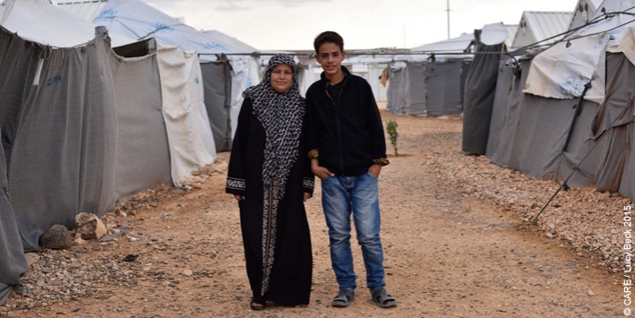 45-year-old Basema, pictured with her son Hussam, lives in Azraq refugee camp in Jordan with two of her sons. Her other two sons and her husband are in Germany and Turkey.