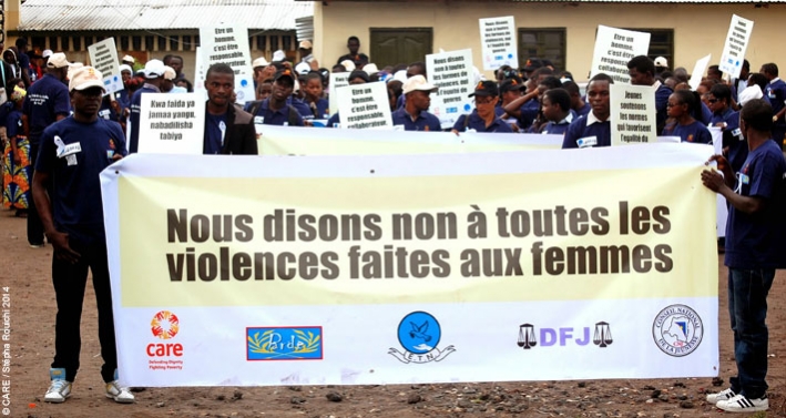 Young men participating in a march against gender-based violence during the &lsquo;16 Days of Activism against GBV&rsquo; campaign in the DRC, December 2014