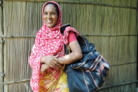 A woman selling products as part of JITA. &copy; Kathryn Richards / CARE 