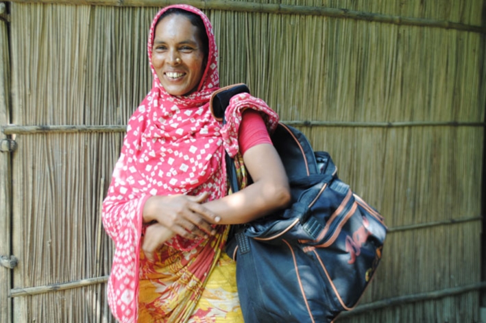 A woman selling products as part of JITA. &copy; Kathryn Richards / CARE 