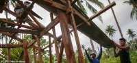 Mutuality, trust, and communications are key components to a good partnership - but how do we turn the rhetoric into reality? (Photo: a community in the Philippines rebuilds a house damaged by Typhoon Haiyan)