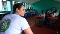 Cocoa Life Ambassador Krystyna Kilmczak meeting with potential future cocoa farmers at a school club set up under the Cocoa Life programme, Ghana