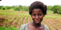 A young female farmer from Malawi. Investing in female smallholders can make a massive difference to food security, yet this issue was skirted over at the the Committee on World Food Security. &copy; CARE