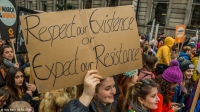 A placard at CARE&rsquo;s #March4Women event on International Women&rsquo;s Day 2018