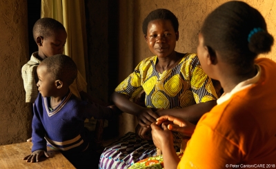  Valentine (centre) attends a CARE women&rsquo;s space in Rwanda which encourages the inclusion of people with disabilities and offers support. 